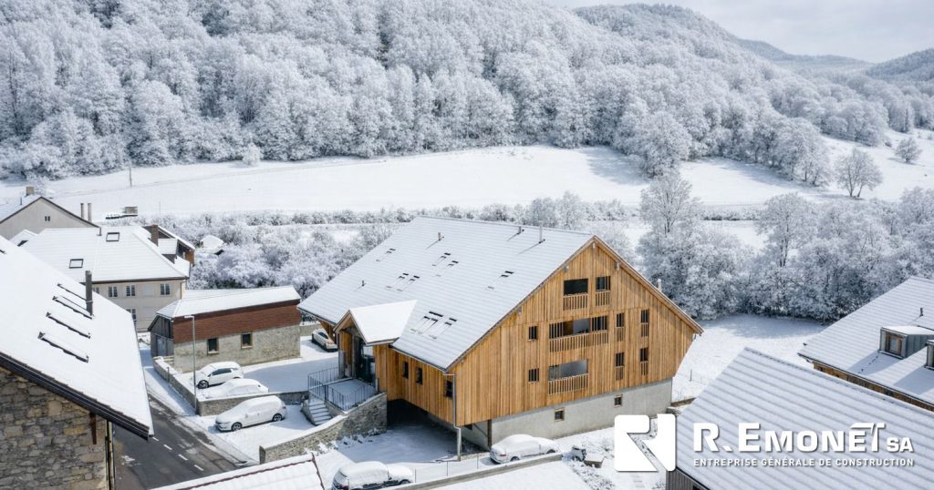 Building renovated by R. Emonet SA under snow